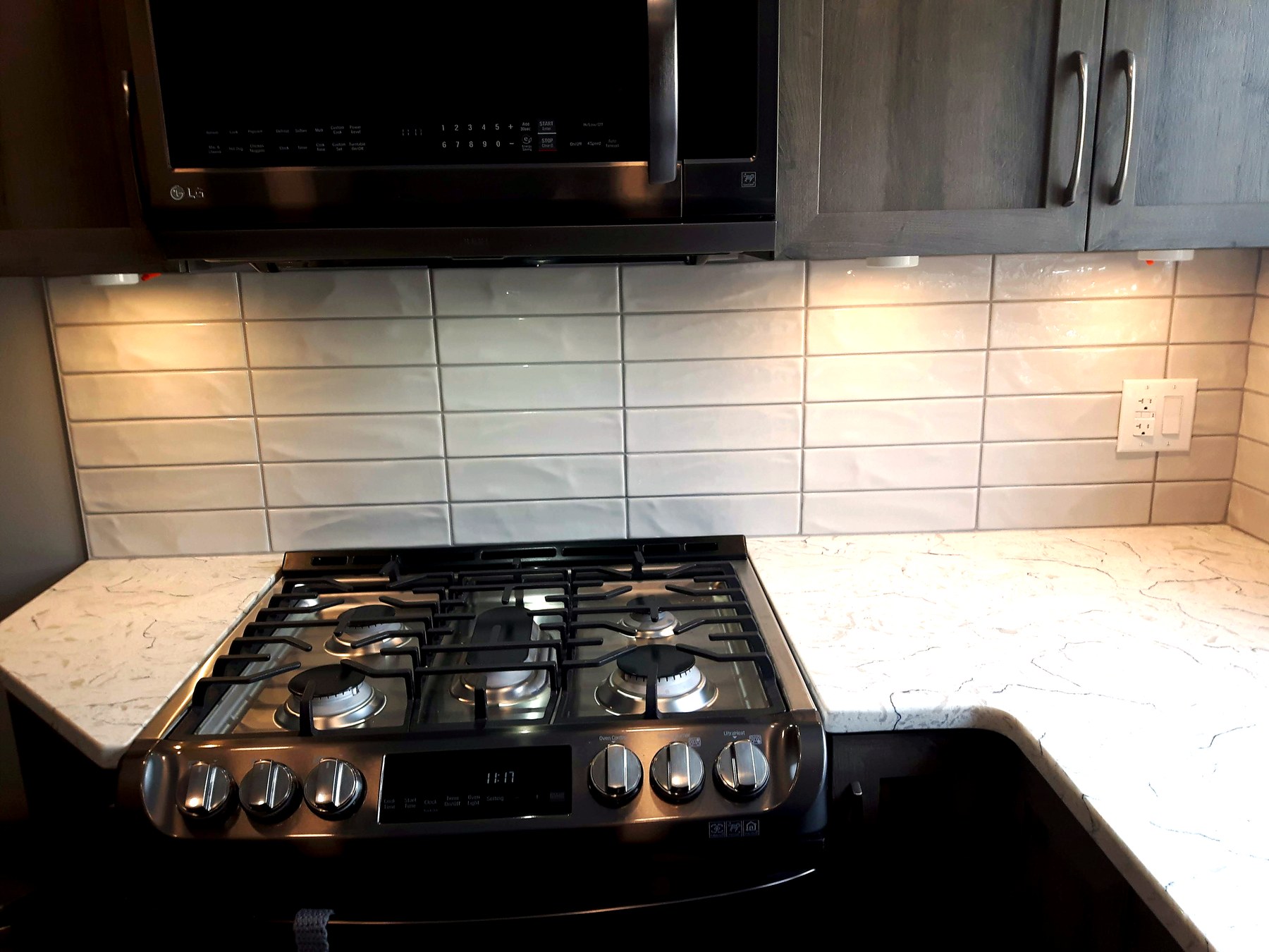 Luxury kitchen renovation Winnipeg with custom cabinetry and quartz countertops